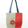 Journey Bloom recycled denim tote bag with embroidered flower handmade in Colombia