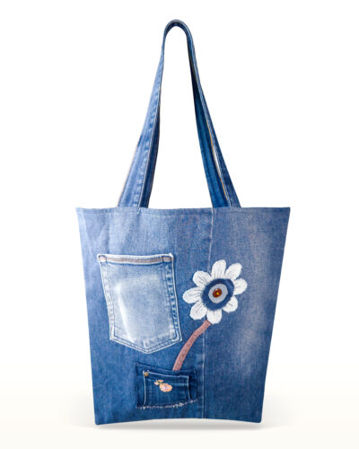 Flor Valiente one-of-a-kind recycled denim tote bag with embroidered flower