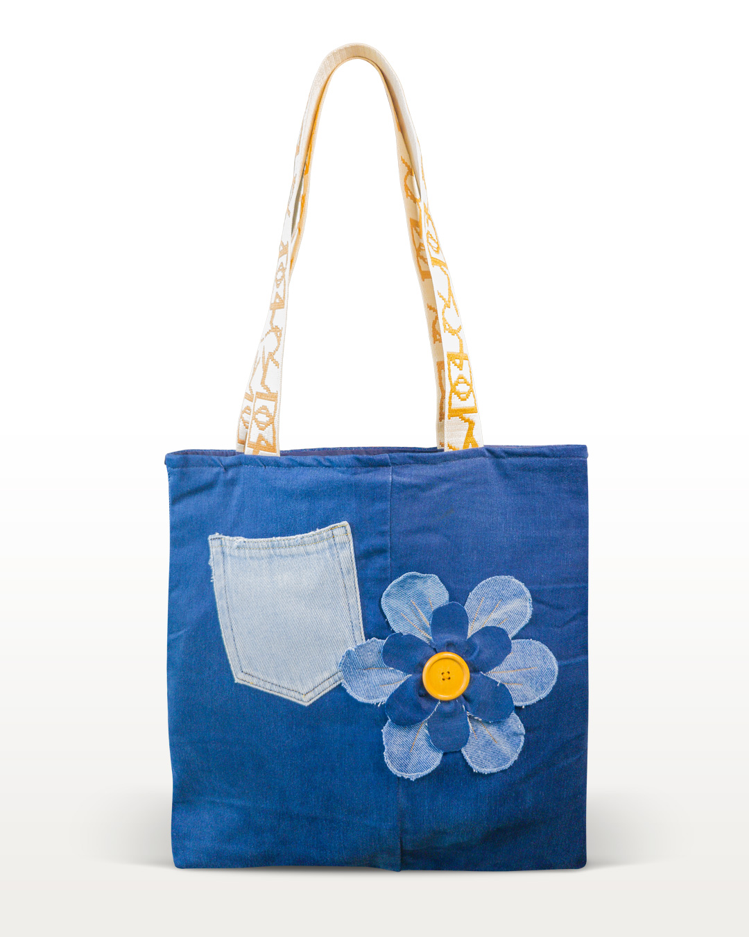 Orange Seed recycled denim tote bag with handmade flower and orange button